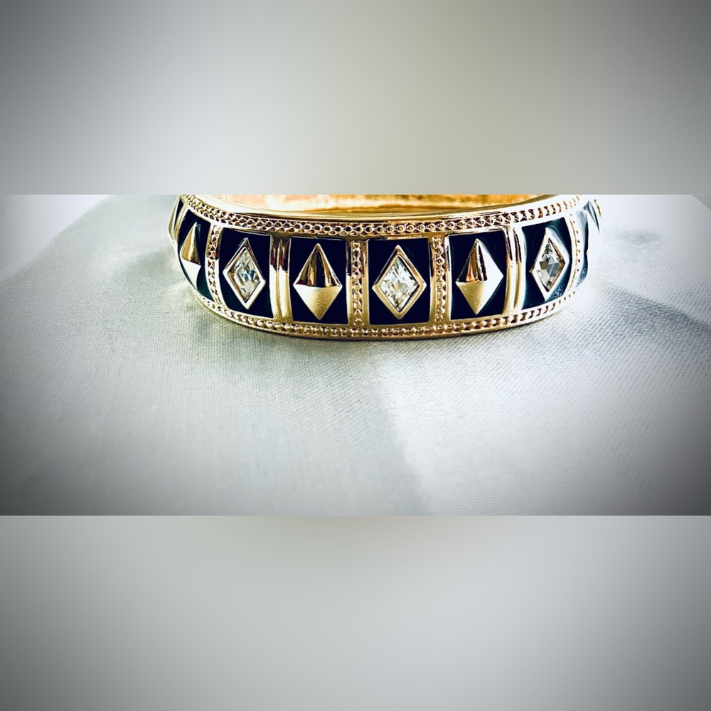 Swarovski Vintage 80’s Bracelet Gold tone, clear crystals and gold,black enamel.